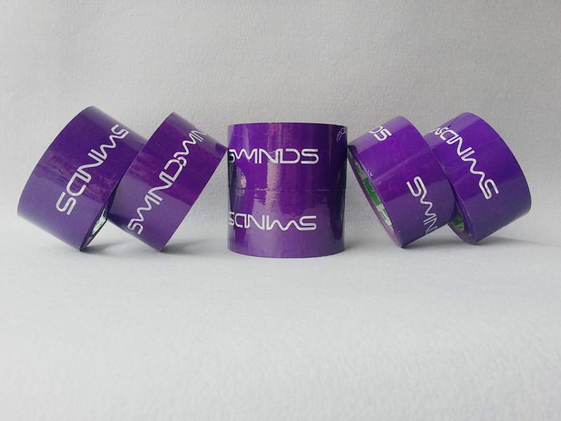 供应55mm印刷胶带紫色底白色字厂家品牌logo订做胶带