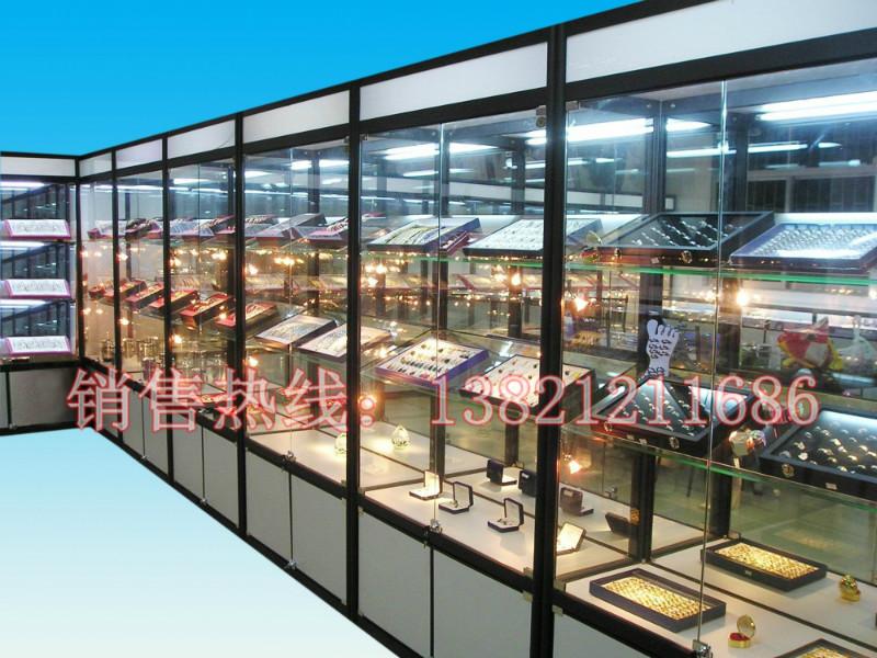 供应4S店展示柜 钛合金展柜 天津精品货架 手机配件柜 玻璃柜台图片