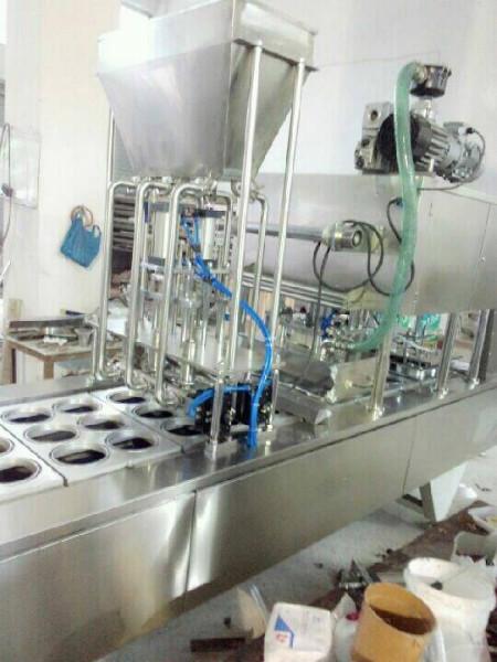 全自动杯装豆浆灌装封口机专用于豆浆、八宝粥、鲜奶、早餐工程必备等产品的封口包装